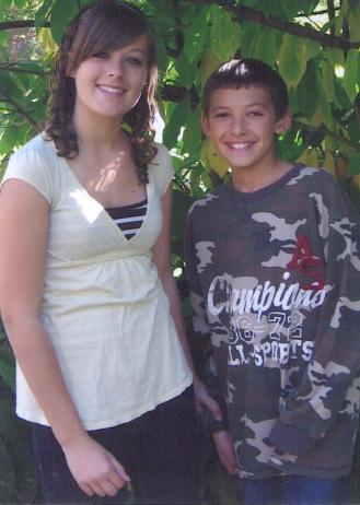 This is the same pretty girl as in the last picture, this time with her brother.